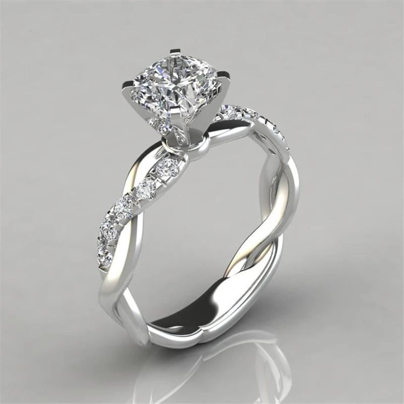 925 Sterling Silver Round Cut Created CZ Twist Halo Ring