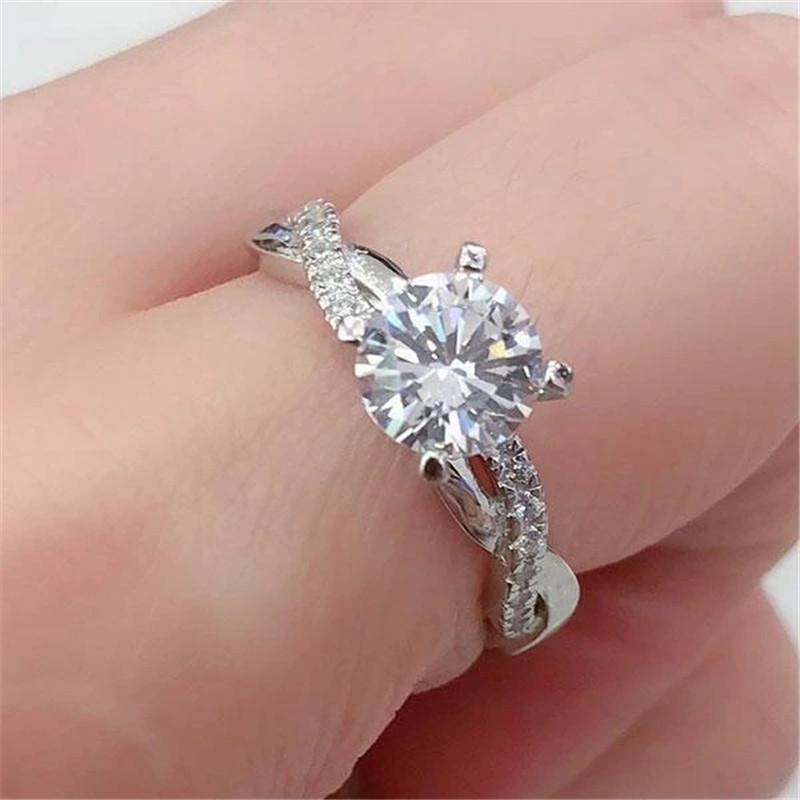 925 Sterling Silver Round Cut Created CZ Twist Halo Ring