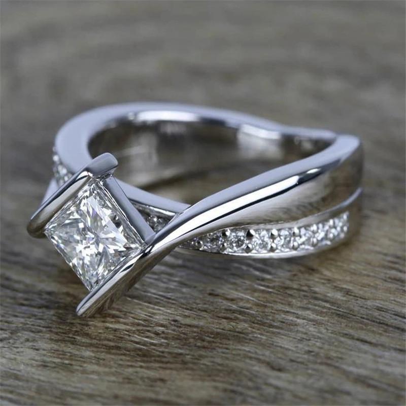 925 Sterling Silver Princess Cut CZ Twist Halo Ring