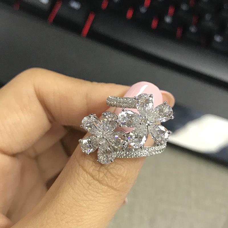 925 Sterling Silver Pear Shaped CZ Twist Shank Flower Ring